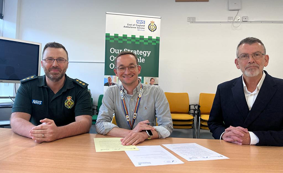 EEAST CEO Tom Abell (centre) signs the Dyslexia Friendly Workplace Pledge, alongside Justin Honey-Jones (left), specialist lecturer practitioner (wellbeing and inclusion) and Dyslexia champion, and Dr Hein Scheffer, Director of Strategy, Culture and Education